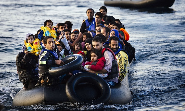 Syrian Refugees arrive on the Greek island of Lesbos after crossing the Aegean Sea from Turkey.