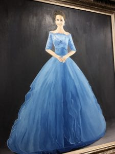 very large oil painting of a woman dressed in a beautiful blue dress
